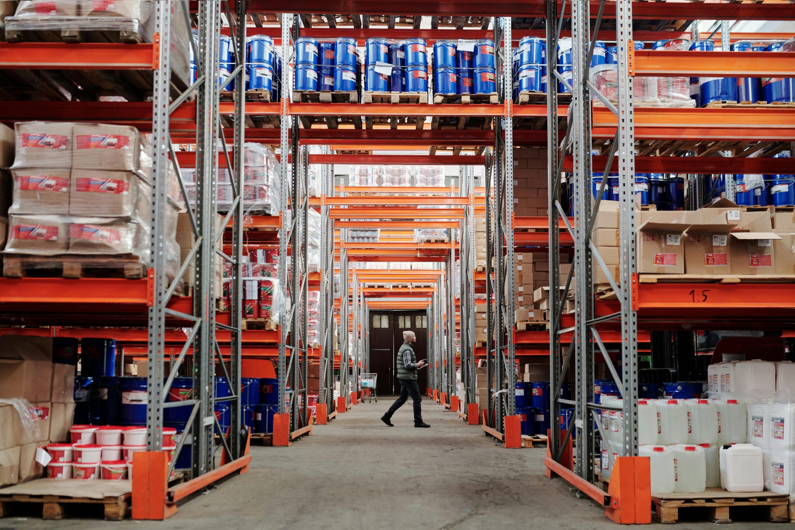 Man Walking in Warehouse